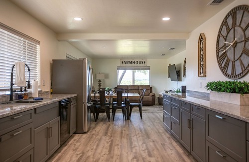 Eagle Point House | Remodeled 3 BR/2.5 BA Retreat near Eagle Point. Includes main house and a private cottage. Group-friendly kitchen, famous waffle bar, hot tub, and electric fireplace. Great space for cooking and connecting.