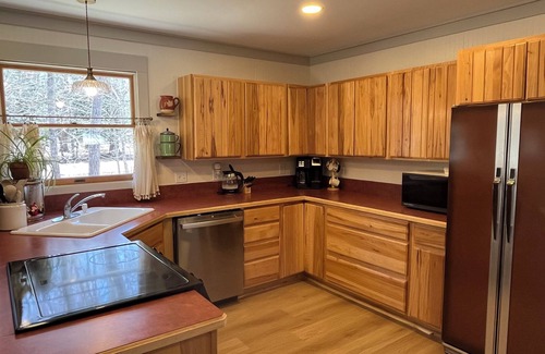 Central Lake House | Remodeled Gem. Kayaks + Lake Access. Under 8 miles to Torch Lake boat launch.