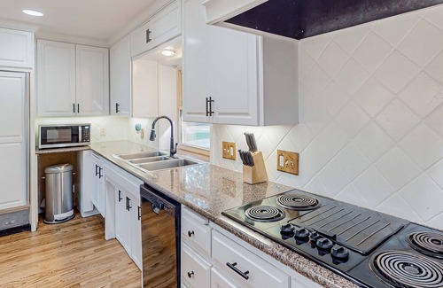 China Spring House | Remodeled riverfront home & guest house with firepit, grill, river views, patio