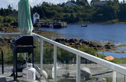 Halifax County House | Renovated 150 year old house, snuggled in the cove with ocean views