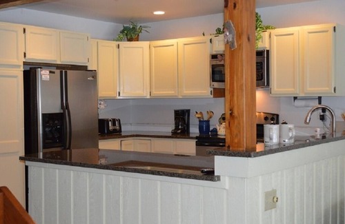 Harbor Springs Condo | Renovated and Updated 4 bedroom/3 bath end unit in Beautiful Harbor Cove