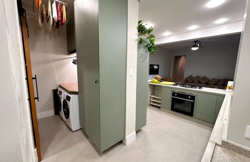 Aparecida Apartment | Renovated beach view condo within walking distance from the mall.