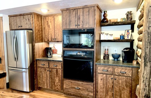 Jacksonport House | Renovated Charming Log Cabin on 4 Acres in Jacksonport