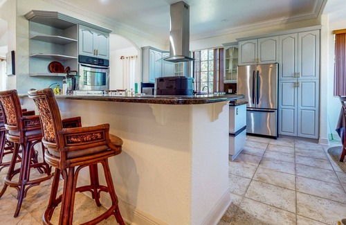 Loxahatchee House | Renovated, elegant retreat with a fitness room, work desks, large deck, & W/D