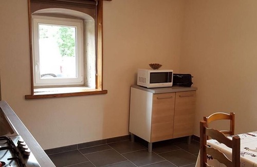Saint-Bresson Cottage | Renovated farmhouse in the Vosges with covered terrace