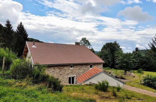 Saint-Bresson Cottage | Renovated farmhouse in the Vosges with covered terrace