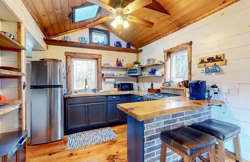 North Troy Cabin | Renovated historic cabin with mountain views, lake access, & electric fireplace