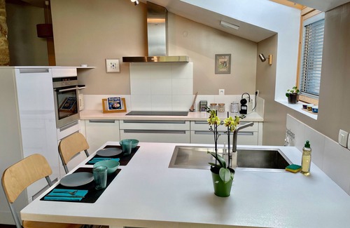 Baden House | Renovated stone house in Baden.