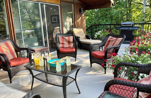 Georgian Bay Cottage | Renovated water front cottage w/firepit, multi level decks & screened in porch.