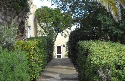 Stintino House | Rent terraced house surrounded by greenery in the residential area "Ancora"