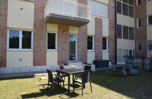 Calambrone Apartment | Residence Il Piviere app 7 with private garden