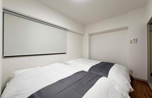 Hiroshima City Centre Apartment | Residence Yu - Relaxing 2BR Near City Center Dining & Kitchen