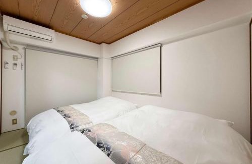 Hiroshima City Centre Apartment | Residence Yu - Relaxing 2BR Near City Center Dining & Kitchen