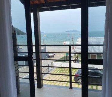 Pantano do Sul Apartment | Residencial Mariano 1 - Vista para praia e Mar