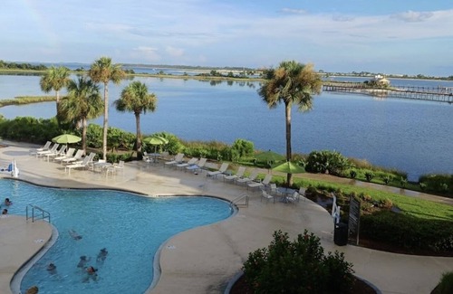 Upper Grand Lagoon Resort | Resort bayside and spa with golfing court.