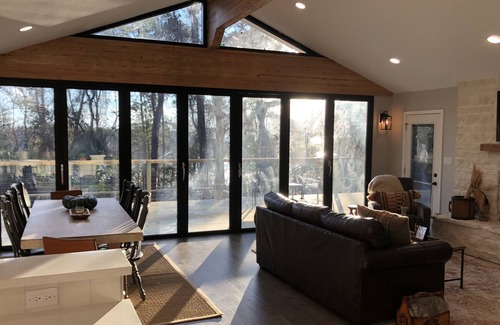 Pointblank House | Restful Hillside Retreat in the Trees by the Lake