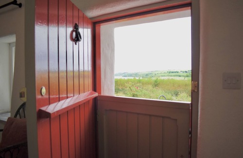 Kinsale House | Restored traditional, old world cottage overlooking the sea in Kinsale