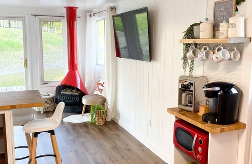 East Dubuque Apartment | Retro floating cabin on river backwaters. HOT TUB!