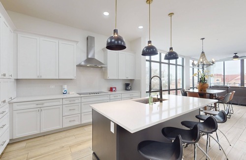 Melbourne Beach Condo | River view retreat with on-site pool, hot tub, & dock plus washer/dryer, & AC
