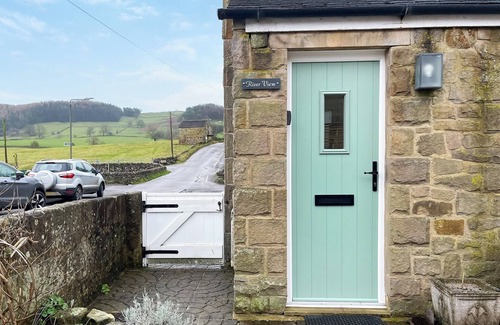 Youlgreave Cottage | River View sits beside the River Bradford with views of the hills and river.