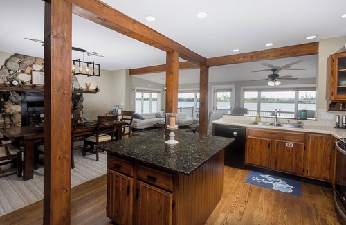 Port Huron House | Riverfront 3BR w/2 Kings, Hot Tub & EV Charger