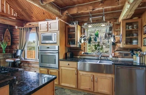 South Boardman House | Riverfront Beach Lodge Home in the Heart of Snowmobile Trails