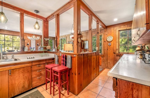 Hacienda House | Riverfront, dog-friendly home with private hot tub, fireplaces & amazing decks