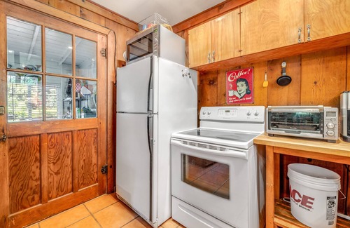 Hacienda House | Riverfront, dog-friendly home with private hot tub, fireplaces & amazing decks