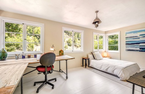 Hacienda House | Riverfront, dog-friendly home with private hot tub, fireplaces & amazing decks