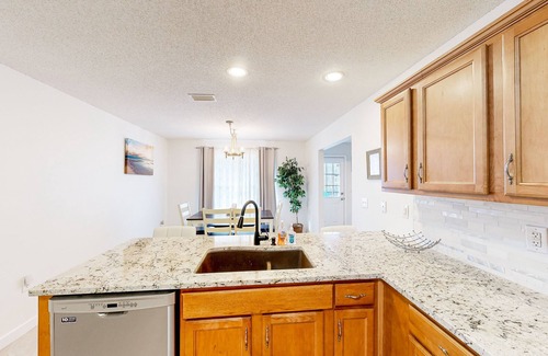 River Trace House | Riverfront home near Gulf beaches with private deck & scenic dock