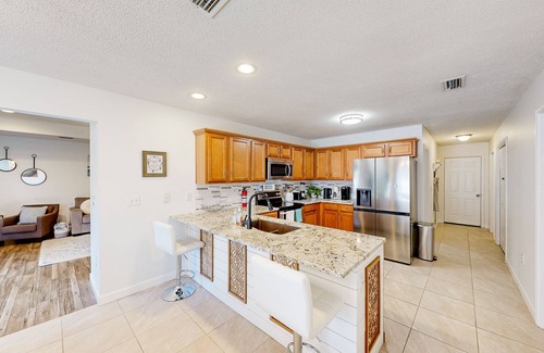 River Trace House | Riverfront home near Gulf beaches with private deck & scenic dock
