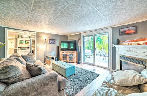 Cheboygan House | Riverfront Home with Dock about 6 Mi to Cheboygan!
