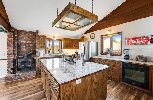 Bigfork House | Riverfront home with private dock, kayaks, 150+ ft Swan River frontage - dogs OK