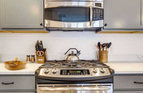Bellaire House | Riverfront Retreat/Hot Tub/Short Walk to Downtown