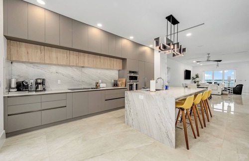 Melbourne House | Riverview Oasis- Riverfront Paradise with Dock, Elevator, Private Pool & Kayaks
