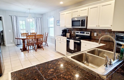 Rogers House | Rogers Retreat, Dog Friendly, Cozy Home. Close to Walmart Amp, Downtown Rogers