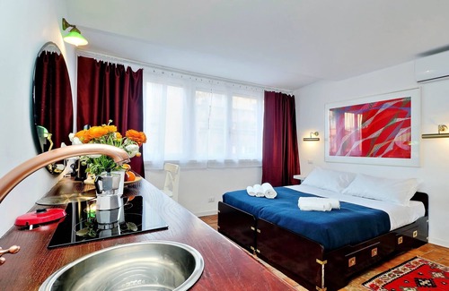 Monti Apartment | Romantic attic with a wonderful terrace, near the Colosseum