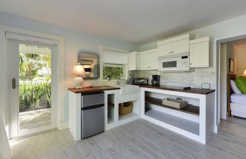 Islamorada House | Romantic Garden View Studio Cottage Nestled in Lush Landscaping with Pool and Dockage located on .