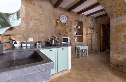 Civita di Bagnoregio Apartment | Romantic home carved into the rock with breathtaking views