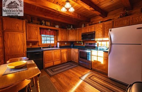 De Soto Cabin | Romantic Log Cabin Hideaway, Hot tub nestled Near the Scenic Mississippi River!