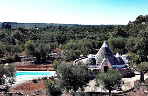 Ceglie Messapica Villa | Romantic trullo with private pool surrounded by nature