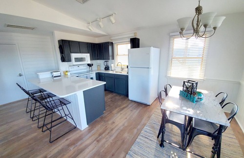 Kitty Hawk Apartment | Roof Deck Views, Deep Soaker Tub, OBX Beaches, Sky High by The East Coast Host