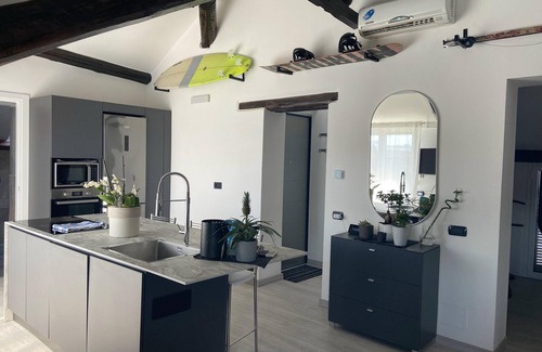 Como City Centre Apartment | Rooftop openspace with balconies, parking and bbq