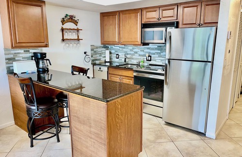 Vanderbilt Beach Condo | ROOFTOP POOL & STEPS TO VANDERBILT BEACH!