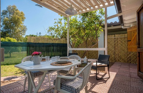 Su Forti Apartment | Room 'Melograno' with Private Garden and Air Conditioning