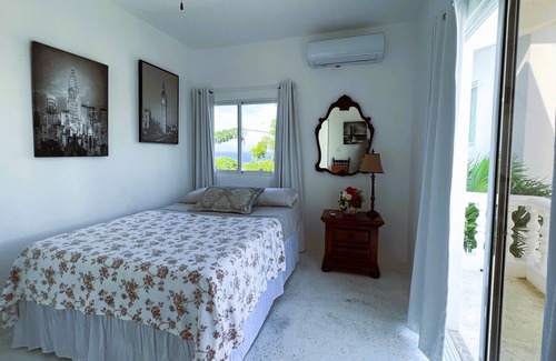 Cabrera Hotel | Room w/ocean view balcony next to the beach. 2 pools, fire pit, gardens & more!