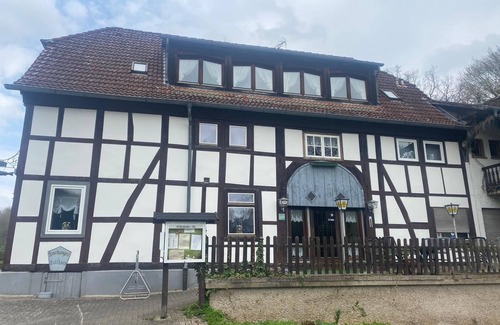Schieder-Schwalenberg House | Room with king-size bed