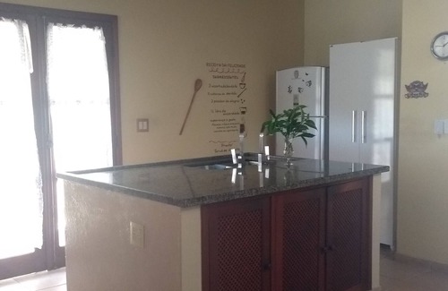 Lindoia House | Room with double bed, and bunk bed,