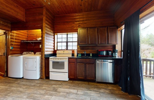 Oakman House | Roomy, three-story mountain home with two full kitchens, game rooms, & AC