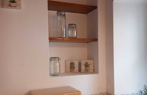 Matera Apartment | Roots - The window in the Sassi